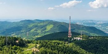Is 5G an Over-Specification for Cellular IoT Devices?